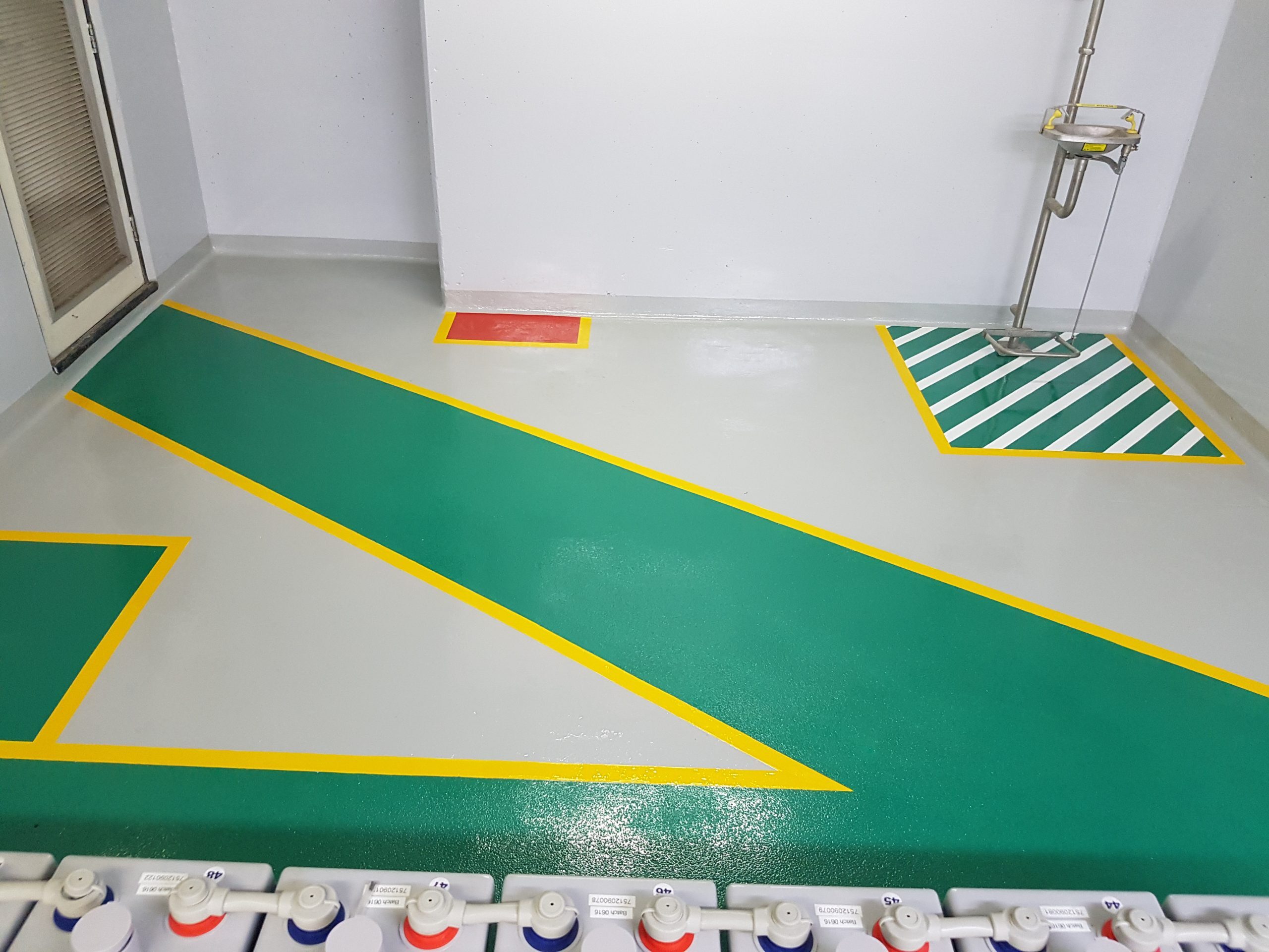 Industrial epoxy floor with safety markings