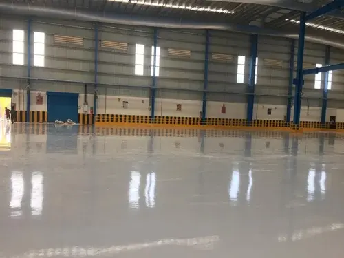 Industrial epoxy floor coating in a warehouse